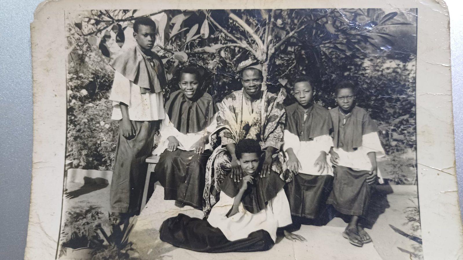 An old group photograph of young altar servers in cassocks and surplices, from Padre Mike’s archive