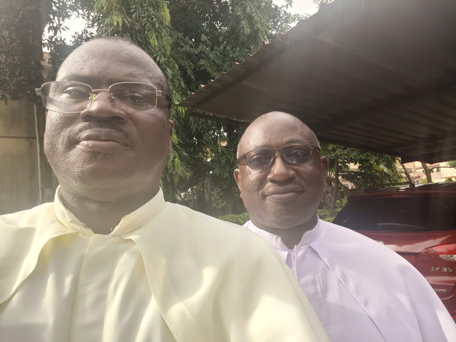 Padre Mike with a fellow priest outdoors