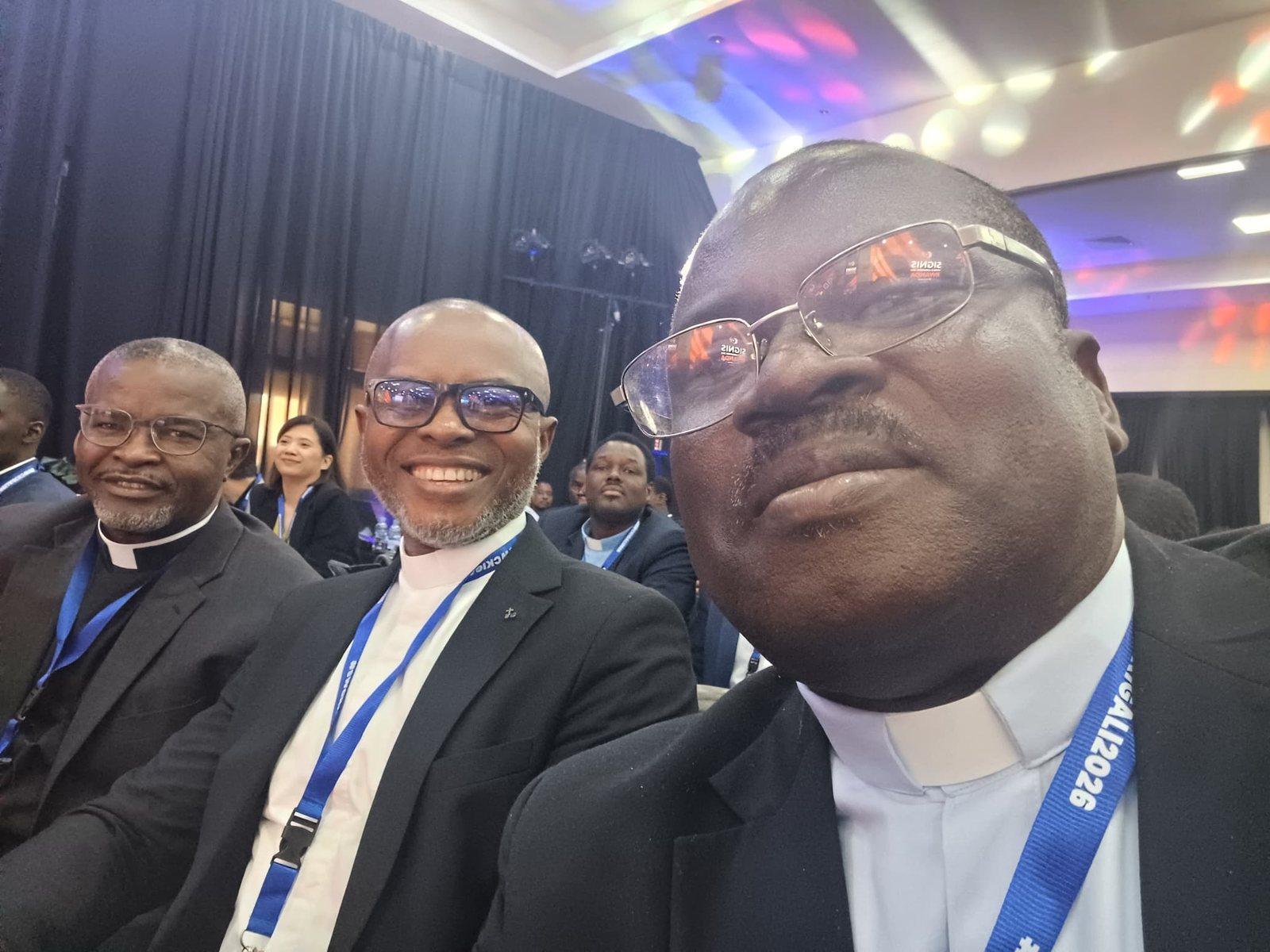 Padre Mike with fellow clergy in the SIGNIS World Congress hall
