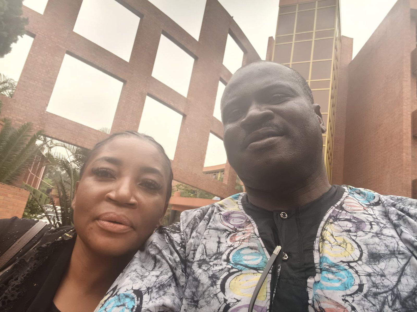 Padre Mike with a friend outside a church