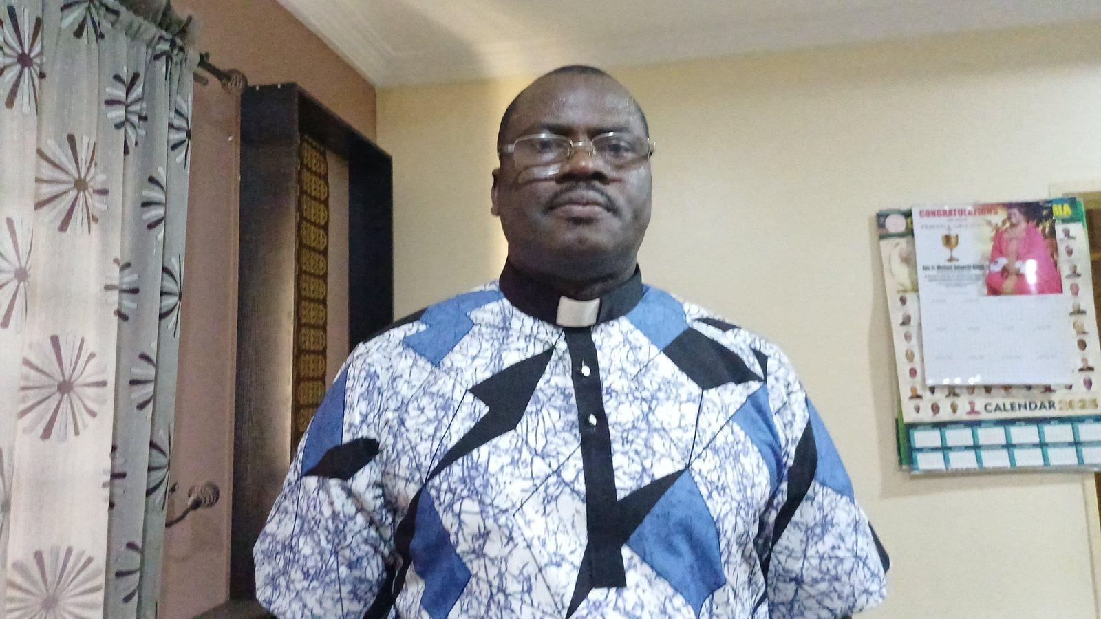 Padre Mike in his office