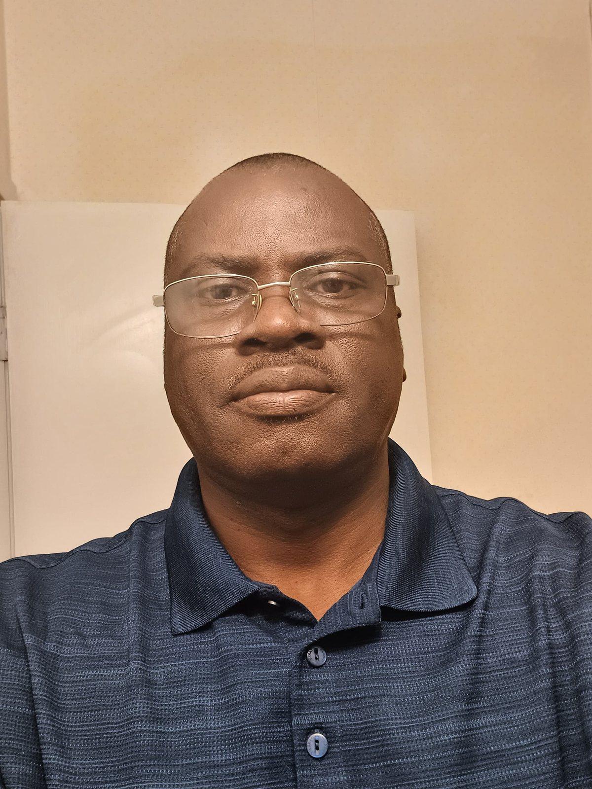 Padre Mike in a navy shirt
