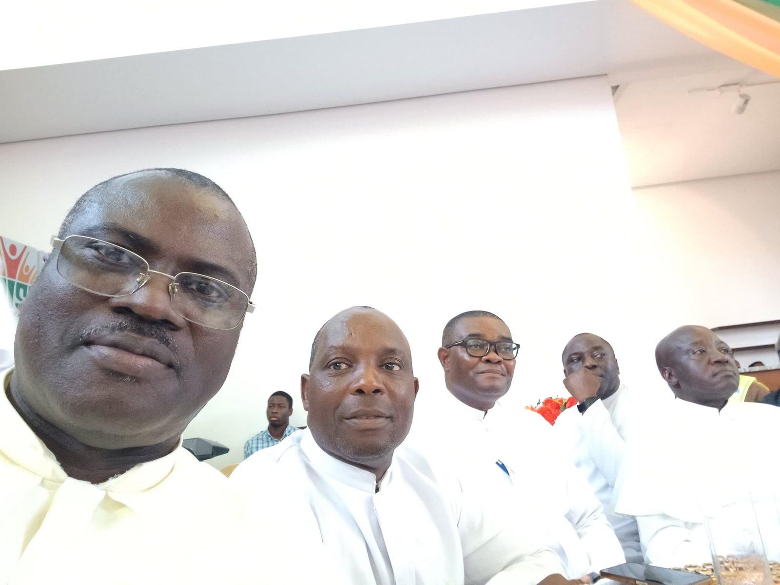 Padre Mike with fellow priests at a gathering
